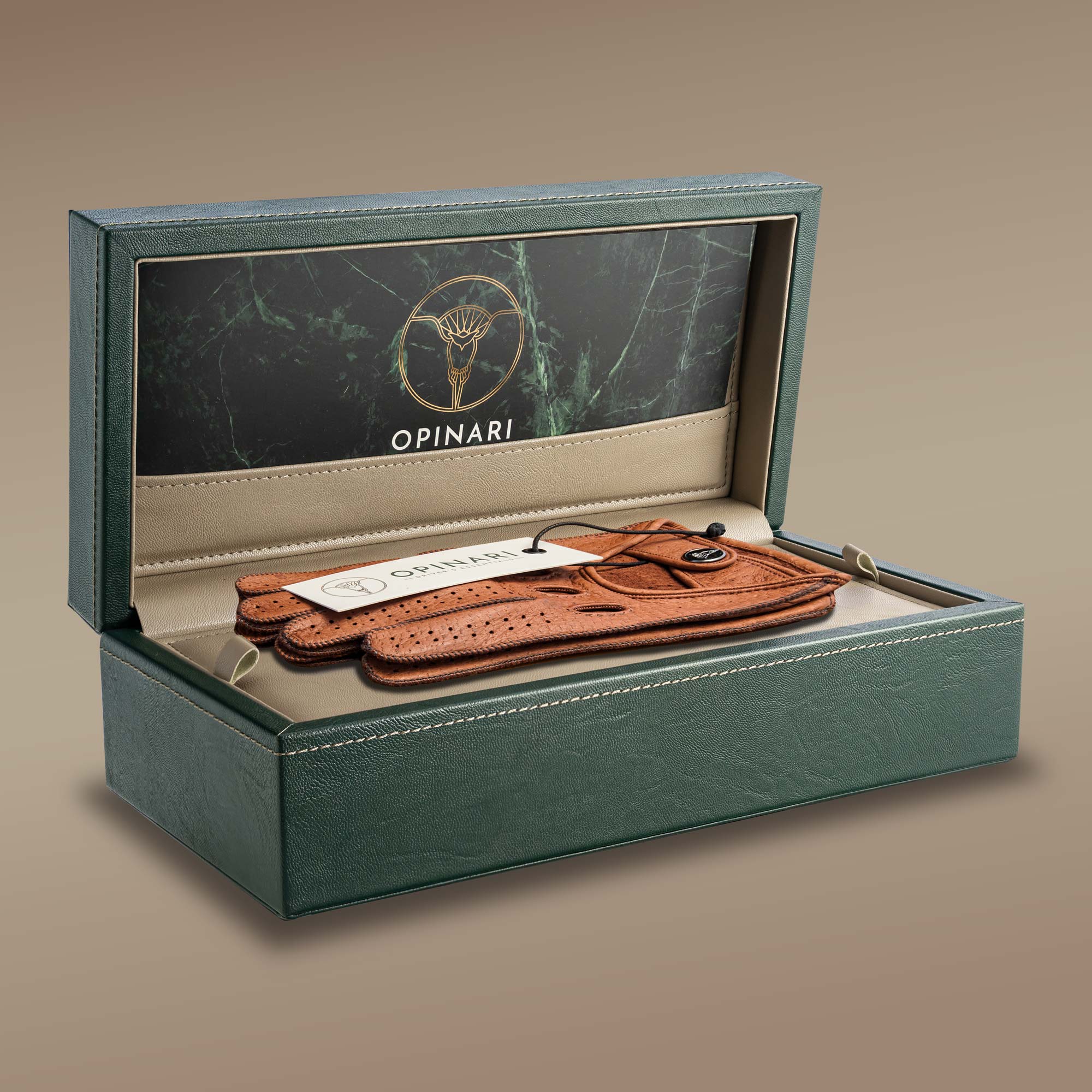 Brown Italian handcrafted leather driving gloves inside a watch box