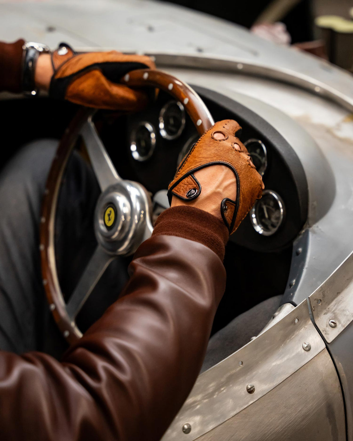 Brown classic driving gloves in Ferrari 375