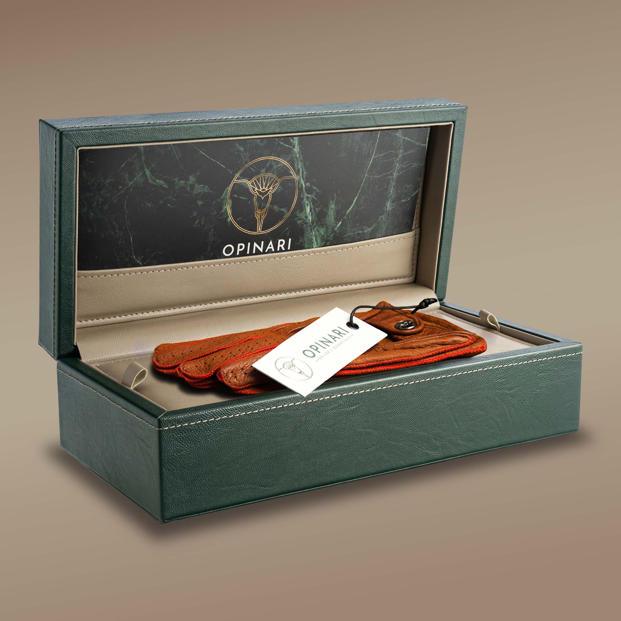 Brown red leather italian driving gloves in a green watchbox