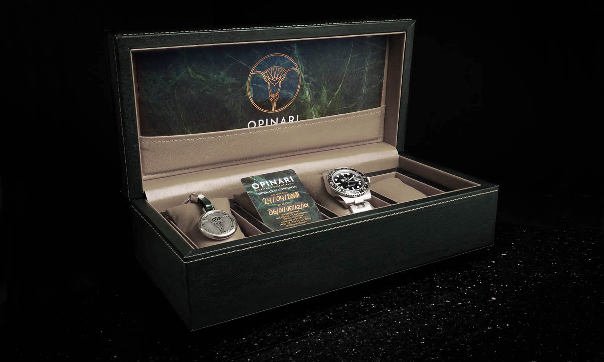 Luxury watch and jewelry set in an open display case with 'Opinari' branding.