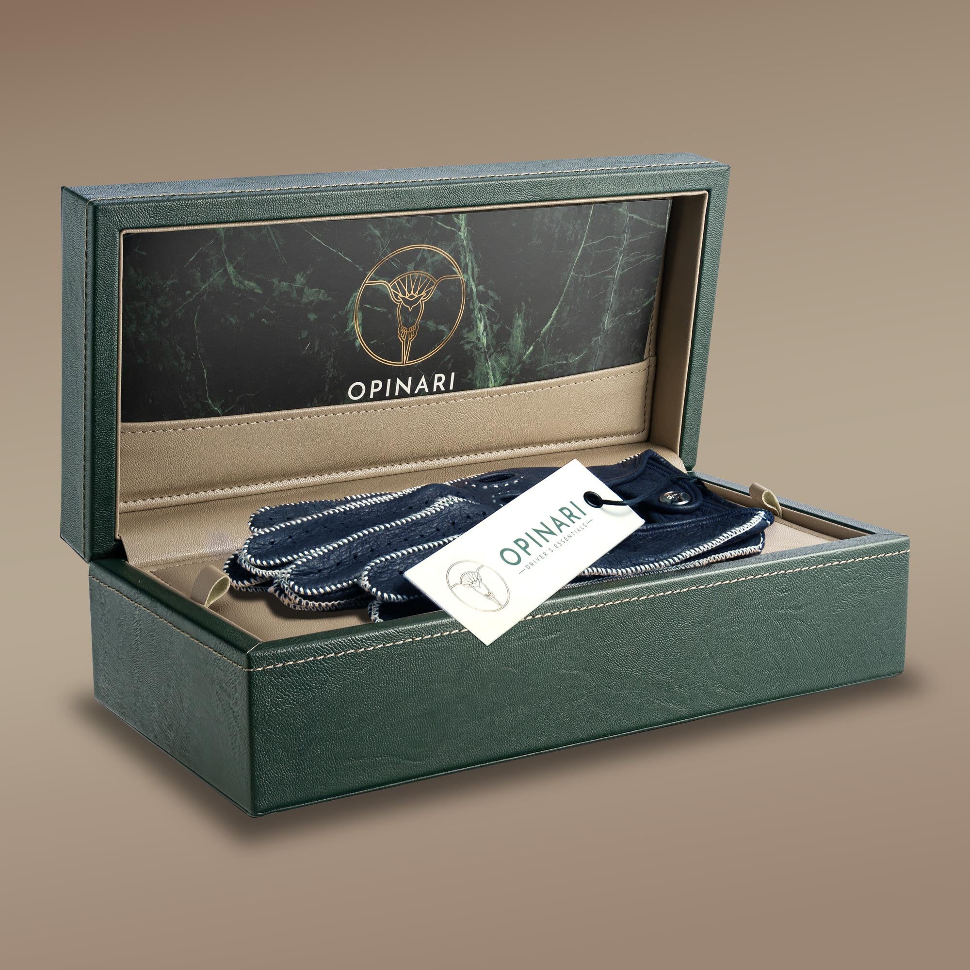 blue white leather men's driving gloves in our green watch box.