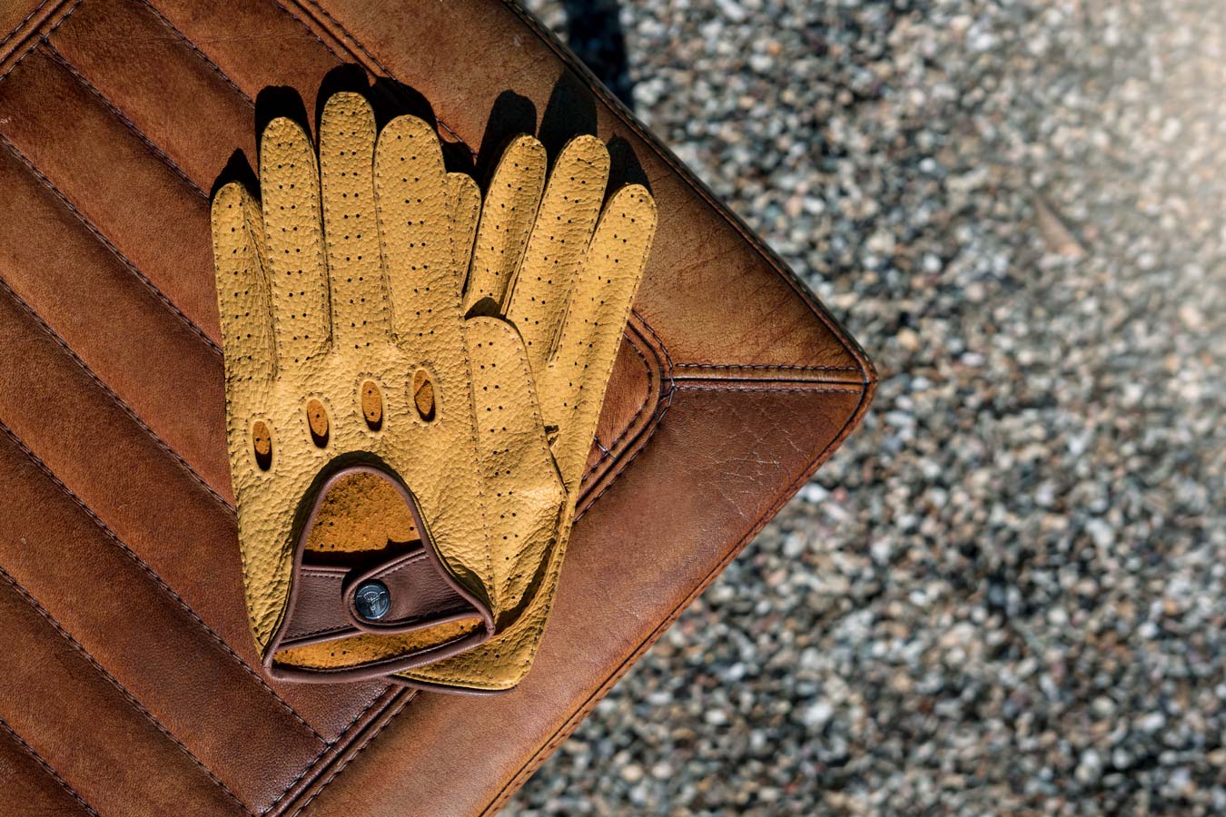 Yellow brown driving gloves