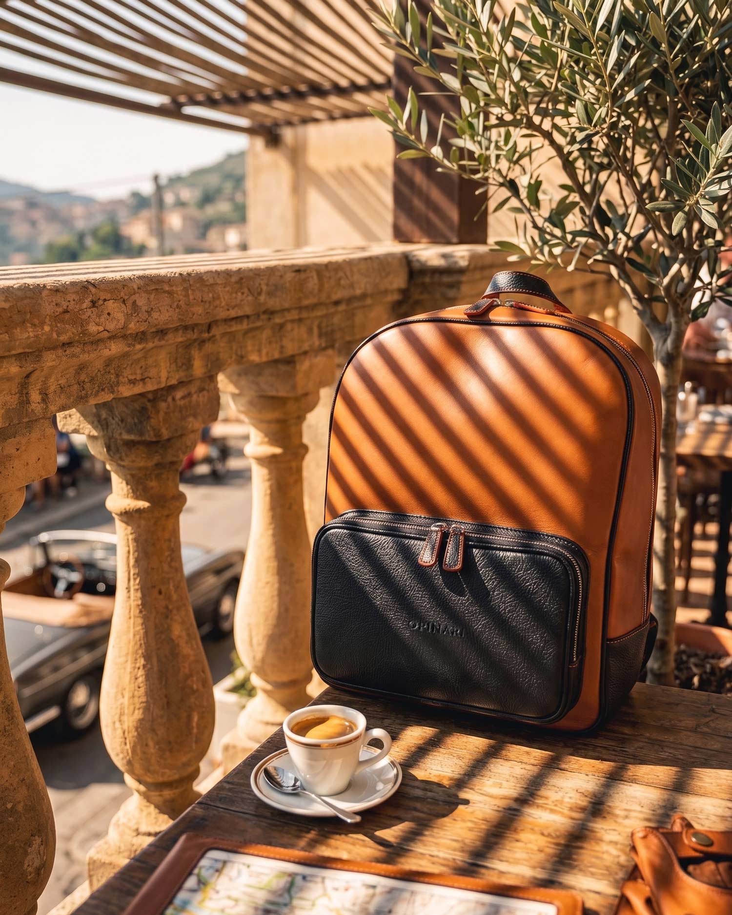 Brown black leather backpack, handcrafted in Italy.