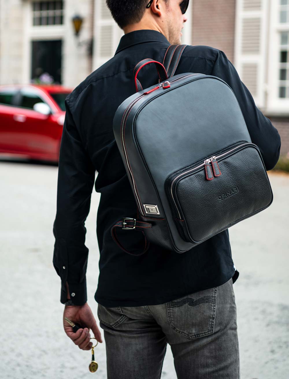 grey black red backpack car related